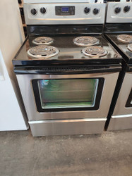 WHIRLPOOL 30 INCH FREE STANDING ELECTRIC RANGE COIL BURNERS 2 LARGE 2 SMALL KEEP WARM OPTION SELF CLEANING OVEN BLACK AND SILVER LOCATED IN OUR PORTLAND OREGON APPLIANCE STORE SKU 18169