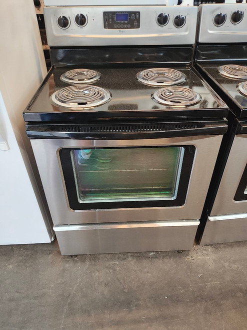 WHIRLPOOL 30 INCH FREE STANDING ELECTRIC RANGE COIL BURNERS 2 LARGE 2 SMALL KEEP WARM OPTION SELF CLEANING OVEN BLACK AND SILVER LOCATED IN OUR PORTLAND OREGON APPLIANCE STORE SKU 18169