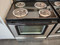 WHIRLPOOL 30 INCH FREE STANDING ELECTRIC RANGE COIL BURNERS 2 LARGE 2 SMALL KEEP WARM OPTION SELF CLEANING OVEN BLACK AND SILVER LOCATED IN OUR PORTLAND OREGON APPLIANCE STORE SKU 18169