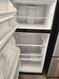 FRIGIDAIRE 18 CUBIC FOOT REFRIGERATOR TOP FREEZER FULL WIDTH GLASS SHELVES 2 CRISPER DRAWERS WIRE SHELF IN REEZER STAINLESS LOCATED IN OUR PORTLAND OREGON APPLIANCE STORE 18300