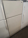 HOTPOINT 14 CUBIC FOOT REFRIGERATOR WIRE SHELVES 2 CRISPER DAWERS SOME DINGS ALMOD LOCATED IN OUR PORTLAND OREGON APPLIANCE STORE SKU 18410
