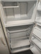 HOTPOINT 14 CUBIC FOOT REFRIGERATOR WIRE SHELVES 2 CRISPER DAWERS SOME DINGS ALMOD LOCATED IN OUR PORTLAND OREGON APPLIANCE STORE SKU 18410