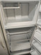 HOTPOINT 14 CUBIC FOOT REFRIGERATOR WIRE SHELVES 2 CRISPER DAWERS SOME DINGS ALMOD LOCATED IN OUR PORTLAND OREGON APPLIANCE STORE SKU 18410