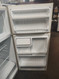 HOTPOINT 14 CUBIC FOOT REFRIGERATOR WIRE SHELVES 2 CRISPER DAWERS SOME DINGS ALMOD LOCATED IN OUR PORTLAND OREGON APPLIANCE STORE SKU 18410
