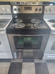 WHIRLPOOL 30 INCH FREE STANDING ELECTRIC RANGE COIL BURNERS 2 LARGE 2 SMALL KEEP WARM OPTION SELF CLEANING OVEN SILVER FRONT BLACK TOP LOCATED IN OUR PORTLAND OREGON APPLIANCE STORE SKU 18428