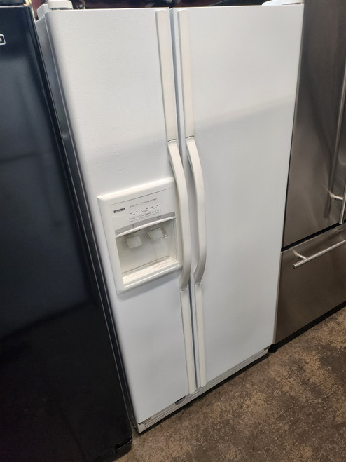 KIENMORE SIDE BY SIDE REFRIGERATOR WITH ICE AND WATER GLASS SHELVES 1 DELI DRAWER 2 CRISPER DRAWERS WIRE SHELVES IN FREEZER PLUS PULL OUT BASKET WHITE LOCATED IN OUR PORTLAND OREGON APPLIANCE STORE SKU 18334