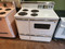 GE VINTAGE 40 INCH FREESTANDING DOUBLE OVEN ELECTRIC RANGE 4 COIL BURNERS 2 LARGE 2 SMALL MANUAL CLEAN OVEN  2 STORAGE DRAWERS WHITE LOCATED IN OUR PORTLAND OREGON APPLIANCE STORE SKU 18438