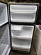 HOTPOINT 17 CUBIC FOOT REFRIGERATOR TOP FREEZER 2 CRISPER DRAWERS 2 ADJUSTABLE WIRE SHELVES WIRE SHELF IN FREEZER SILVER WITH BLACK HANDLES LOCATED IN OUR PORTLAND OREGON APPLIANCE STORE SKU 18492