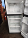 WHIRLPOOL GOLD 19 CUBIC FOOT REFRIGERATOR TOP FREEZER AUTOMATIC DEFROST 4 SPLIT ADJUSTABLE GLASS SHLVES 1 DELI PAN 2 CRISPER DRAWERS SLIVER DOORS BLACK CABINET LOCATED IN OUR PORTLAND OREGON APPLIANCE STORE SKU 18502