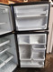 WHIRLPOOL GOLD 19 CUBIC FOOT REFRIGERATOR TOP FREEZER AUTOMATIC DEFROST 4 SPLIT ADJUSTABLE GLASS SHLVES 1 DELI PAN 2 CRISPER DRAWERS SLIVER DOORS BLACK CABINET LOCATED IN OUR PORTLAND OREGON APPLIANCE STORE SKU 18502