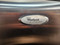 WHIRLPOOL GOLD 19 CUBIC FOOT REFRIGERATOR TOP FREEZER AUTOMATIC DEFROST 4 SPLIT ADJUSTABLE GLASS SHLVES 1 DELI PAN 2 CRISPER DRAWERS SLIVER DOORS BLACK CABINET LOCATED IN OUR PORTLAND OREGON APPLIANCE STORE SKU 18502