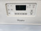 WHIRLPOOL 30 INCH FREESTANDING GLASS TOP ELECTRIC RANGE KEEP WARM OPTION WITH SELF CLEAN AND STEAM CLEAN SETTING 4 BURNER WHITE COSMETIC ISSUES ON FRONT BURNERS WHITE LOCATED IN OUR PORTLAND OREGON APPLIANCE STORE SKU 18649