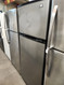 ESTATE BY WHIRLPOOL 18 CUBIC FOOT RERIGERATOR TOP FREEZER GLASS SHELVES 1 DELI DRAWER 2 CRISPER DRAWERS GLASS SHELF IN FREEZER SILVER WITH BLACK TRIM LOCATED IN OUR PORTLAND OREGON APPLIANCE STORE SKU 18916