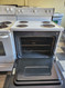 HOTPOINT 30 INCH FREESTANDING ELECTRIC RANGE COIL BURNERS 3 SMALL 1 LARGE MANUAL CLEAN OVEN WHITE LOCATED IN OUR PORTLAND OREGON APPLIANCE STORE SKU 18920