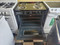 Summit 30 Inch Freestanding Electric Range with 4 Coil Burners, 3.7 cu. ft. Oven Capacity, Storage Drawer, Oven Window, Adjustable Oven Racks Indicator Lights, Waist-High Broiler BLACK AND STAINLESS LOCATED IN OUR PORTLAND OREGON APPLIANCE STORE SKU 18927