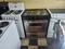Summit 30 Inch Freestanding Electric Range with 4 Coil Burners, 3.7 cu. ft. Oven Capacity, Storage Drawer, Oven Window, Adjustable Oven Racks Indicator Lights, Waist-High Broiler BLACK AND STAINLESS LOCATED IN OUR PORTLAND OREGON APPLIANCE STORE SKU 18927
