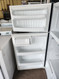 HOTPOINT 16 CUBIC FOOT REFRIGERATOR TOP FREEZER WIRE SHELVES 2 CRISPER DRAWERS WHITE LOCATED IN OUR PORTLAND OREGON APPLIANCE STORE SKU 18946