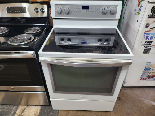Whirlpool Gold White Ice 30 Inch Freestanding Smooth top Electric Range with 4 Radiant Elements, Warm Zone, 6.2 cu. ft. Time Savor Plus True Convection Oven, Self-Cleaning and Storage Drawer: White Ice - White with Silver Handle SKU 18974