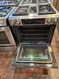 JENN-AIR DUAL FUEL SLIDE IN DOWN DRAFT RANGE 2 BURNERS AND GRILL RAPID PRE- HEAT CONVECTION SELF CLEANING OVEN STAINLESS LOCATED IN OUR PORTLAND OREGON APPLIANCE STORE SKU 18992