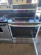 GE PROFILE 30 INCH SMOOTH TOP FREESTANDING ELECTRIC RANGE 5 BURNER CONVECTION HI/LO BROIL SETTING STEAM OR SELF CLEAN OPTION DELAYED COOK TIME STAINLESS BLACK SKU 19010