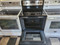 WHIRLPOOL 30 INCH FREESTANDING SMOOTH TOP ELECTRIC RANGE 4 BURNER 2 LARGE 2 SMALL MANUAL CLEAN OVEN STAINLESS BLACK TOP LOCATED IN OUR PORTLAND OREGON APPLIANCE STORE SKU 19027