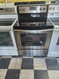 WHIRLPOOL 30 INCH FREESTANDING SMOOTH TOP ELECTRIC RANGE 4 BURNER 2 LARGE 2 SMALL MANUAL CLEAN OVEN STAINLESS BLACK TOP LOCATED IN OUR PORTLAND OREGON APPLIANCE STORE SKU 19027