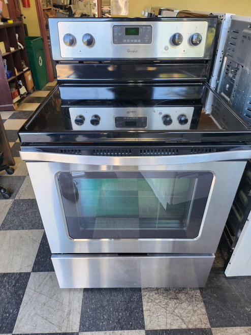WHIRLPOOL 30 INCH FREESTANDING ELECTRIC RANGE 5 BURNER SMOOTH TOP 1 LARGE DUAL 1 LARGE 2 SMALL 1 WARMING BURNER STEAM CLEAN AND SELF-CLEANING OPTION BLACK STAINLESS LOCATED IN OUR PORTLAND OREGON APPLIANCE STORE SKU 19072