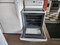 GE 30 INCH FREE STANDING ELECTRIC RANGE COIL BURNERS 2 LARGE 2 SMALL HI LO BROIL SETTING MANUAL CLEAN OVEN WHITE LOCATED IN OUR PORTLAND OREGON APPLIANCE STORE SKU 19096