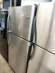 Frigidaire 30 Inch Top Freezer Refrigerator with 20.4 cu. ft. Store-More Gallon Shelf, Deli Drawer, Clear Dairy Bin, Full-Width Freezer Shelf, and Reversible Door: Stainless Steel LOCATED IN OUR PORTLAND OREGON APPLIANCE STORE SKU 19111