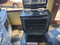 WHIRLPOOL 30 INCH FREESTANDING ELECTRIC RANGE COIL BURNERS 2 LARGE 2 SMALL KEEP WARM OPTION SELF CLEANING OVEN BLACK AND STAINLESS LOCATED IN OUR PORLAND OREGON APPLIANCE SKU 19120