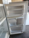 HOTPOINT 14 CUBIC FOOT POCKET DOOR REFRIGERTOR TOP FREEZER WIRE SHELVES 2 CRISPER DRAWERS WHITE LOCATED IN OUR PORTLAND OREGON APPLIANCE STORE SKU 19124