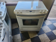 FRIGIDAIRE 30 INCH SLIDE IN SMOOTH TOP ELECTRIC RANGE 4 BURNERS 1 LARGE DUAL 1 LARGE 2 SMALL SELF CLEANING OVEN BISQUE LOCATED IN OUR PORTLAND OREGON APPLIANCE STORE SKU 19131