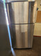 Whirlpool WRT511SZDM 33 Inch Top Freezer Refrigerator with 21 cu. ft. Capacity Glass Shelves, Flexi-Slide Bin, Gallon Door Storage, Crisper Drawers, LED Lighting Monochromatic Stainless Steel LOCATED IN OUR PORTLAND OREGON APPLIANCE STORE SKU 19133