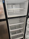 ESTATE BY WHIRLPOOL 18 CUBIC FOOT REFRIGERATOR FULL WIDTH ADJUSTABLE GLASS SHELVES IN BOTH REFRIGERATOR AND FREEZER 1 DELI AND 2 CRISPER DRAWERAS SILVER LOCATED IN OUR PORTLAND OREGON APPLIANCE STORE SKU 19138
