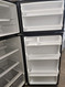 ESTATE BY WHIRLPOOL 18 CUBIC FOOT REFRIGERATOR FULL WIDTH ADJUSTABLE GLASS SHELVES IN BOTH REFRIGERATOR AND FREEZER 1 DELI AND 2 CRISPER DRAWERAS SILVER LOCATED IN OUR PORTLAND OREGON APPLIANCE STORE SKU 19138