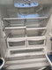 AMANA 25 CUBIC FOOT FRENCH DOOR REFRIGEATOR WITH ICE MAKER AND INTERNAL WATER DISPENSER GLASS SHELVES 2 CRISPER DRAWERS 1 LARGE PANTRY DRAWER PULL OPEN FREEZER DOOR WHITE LOCATED IN OUR PORTLAND OREGON APPLIANCE STORE SKU 19142