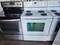WHIRLPOOL 30 INCH FREESTANDING ELECTRIC RANGE COIL BURNERS 2 LARGE 2 SMALL SELF CLEANING OVEN KEEP WARM OPTION STORAGE DRAWER WHITE LOCATED IN OUR PORTLAND OREGON APPLIANCE STORE SKU 19146