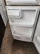 GE 18 CUBIC FOOT REFRIGERATOR TOP FREEZER ADJUSTABLE GLASS SHELVES 2 CRISPER DRAWERS PLUS DELI DRAWER FULL WIDTH WIRE SHELF IN FREEZER WHITE LOCATED IN OUR POTLAND OREGON APPLIANCE STORE SKU 19163