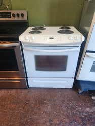 FRIGIDAIRE 30 INCH SLIDE-IN ELECTRIC RANGE COIL BURNERS 2 LARGE 2 SMALL SELF CLEANING OVEN WHITE LOCATED IN OUR PORTLAND OREGON APPLIANCE STORE SKU 19165