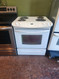 FRIGIDAIRE 30 INCH SLIDE-IN ELECTRIC RANGE COIL BURNERS 2 LARGE 2 SMALL SELF CLEANING OVEN WHITE LOCATED IN OUR PORTLAND OREGON APPLIANCE STORE SKU 19165