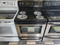 FRIGIDAIRE 30 INCH FREESTADING ELECTRIC RANGE COIL BURNERS 2 LARGE 2 SMALL SELF CLEANING OVEN STAINLESS BLACK LOCATED IN OUR PORTLAND OREGON APPLIANCE STORE SKU 19212