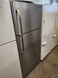 Frigidaire 30 Inch Top-Freezer Refrigerator with Store-More Crispers, Deli Drawer, 18.0 cu. ft. Adjustable Glass Shelves, Gallon Door Storage, Clear Dairy Bin and White Cabinet Stainless front LOCATED IN OUR PORTLAND OREGON APPLIANCE STORE SKU 19215
