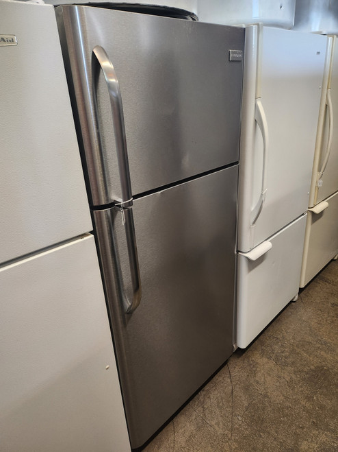 Frigidaire 30 Inch Top-Freezer Refrigerator with Store-More Crispers, Deli Drawer, 18.0 cu. ft. Adjustable Glass Shelves, Gallon Door Storage, Clear Dairy Bin and White Cabinet Stainless front LOCATED IN OUR PORTLAND OREGON APPLIANCE STORE SKU 19215