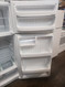GE 17 CUBIC FOOTREFRIGERATOR TOP FREEZER ADJUSTABLE WIRE SHELVES GLASS CRISPER COVER WITH 2 DRAWERS CLEAR DAIRY DOOR WHITE LOCATED IN OUR PORTLAND OREGON APPLIANCE STORE SKU 12939