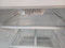 FRIGIDAIRE 16 CUBIC FOOT REFRIGERATOR TOP FREEZER FULL WIDTH GLASS SHELVES 2 CRISPER DRAWERS 1 DELI DRAWER FULL WIDTH WIRE SHELF IN FREEZER WHITE LOCATED IN OUR PORTLAND OREGON APPLIANCE STORE SKU 19242