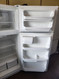 KENMORE POCKET DOOR REFRIGERATOR 16 CUBIC FOOT TOP FREEZER WIRE SHELVES 2 CRISPER DRAWERS WHITE LOCATED IN OUR PORTLAND OREGON APPLIANCE STORE SKU 19246