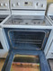WHIRLPOOL 30 FREESTANDING GLASS TOP RANGE 4 BURNER 2 LARGE 2 SMALL CUSTOM BROIL SELF CLEANING OVEN STORAGE DRAWER WHITE LOCATED IN OUR PORTLAND OREGON APPLIANCE STORE SKU 19268
