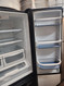 AMANA 25 CUBIC FOOT FRENCH DOOR REFRIGERATOR BOTTOM FREEZER WITH ICE MAKER GLASS SHELVES 2 CRISPER DRAWERS LARGE DELI DRAWER PULL OPEN FREEZER DOOR BLACK LOCATED IN OUR PORTLAND OREGON APPLIANCE STORE SKU 19278