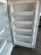 RIGIDAIRE 17 CUBIC FOOT UPRIGHT FREEZER AUTO DEFROST 4 WIRE SHELVES 2 PULL OUT BASKETS 5 STORAGE SHELVES IN THE DOOR WHITE LOCATED IN OUR PORTLAND OREGON APPLIANCE STORE SKU 19282