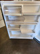 WHIRLPOOL 21 CUBIC FOOT REFRIGERATOR TOP FREEZER ADJUSTABLE GLASS SHELVES 2 CRISPER DRAWERS WIRE SHELF IN FREEZER WHITE LOCATED IN OUR PORTLAND OREGON APPLIANCE STORE SKU 19284